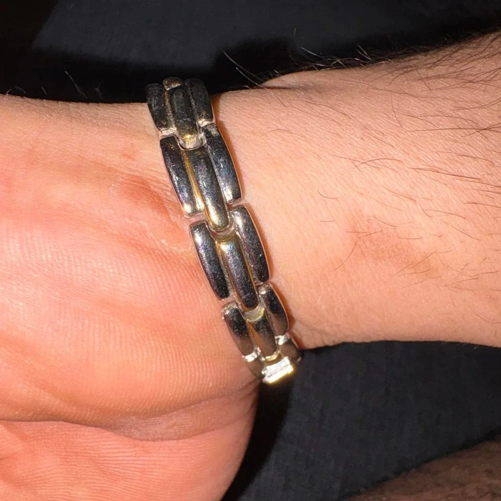 Silver bracelet with gold accents